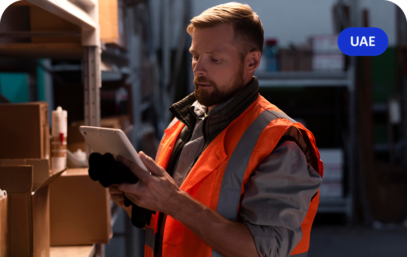 Port worker using a tablet